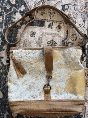 Myra bag. Gold cowhide and leather very unique!!